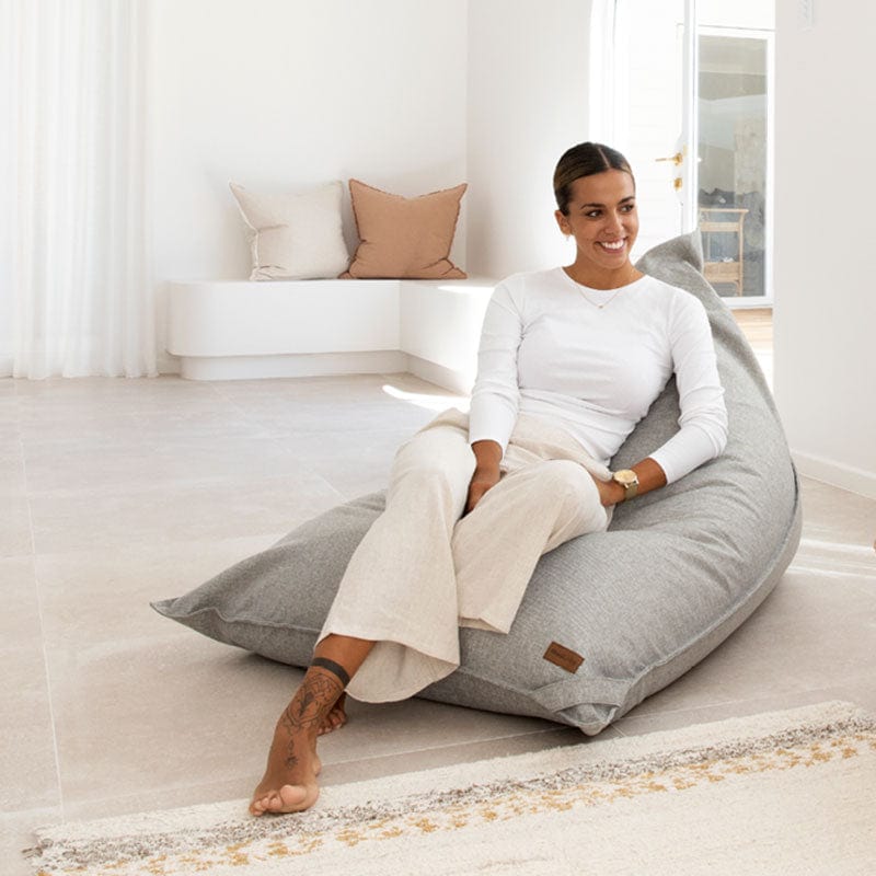 Indoor Komfort triangle bean bag in Owl Grey – supportive, minimalist seating with a soft textured finish