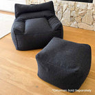 Modern Black Bouclé Serena bean bag chair shown with coordinating ottoman.