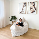 Oversized champagne Cloud Bean Bag mat indoor bean bag by Mooi Living with a woman relaxing and reading indoors
