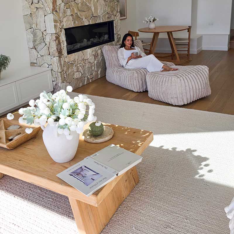 Brooklyn Luxe Lounger Foam Filled Bean Bag in Corduroy Faux Fur indoor Bean Bag by Mooi Living. on timber flooring in a modern living room.
