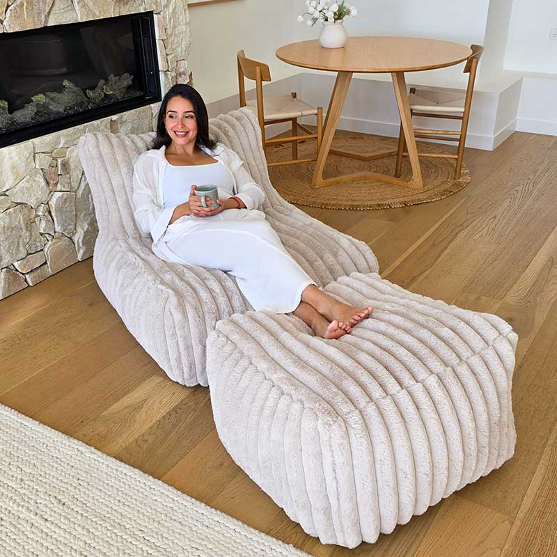 Brooklyn Luxe Lounger Foam Filled indoor bean bag by Mooi Living in Corduroy Faux Fur by Mooi Living on timber flooring in a modern living room.