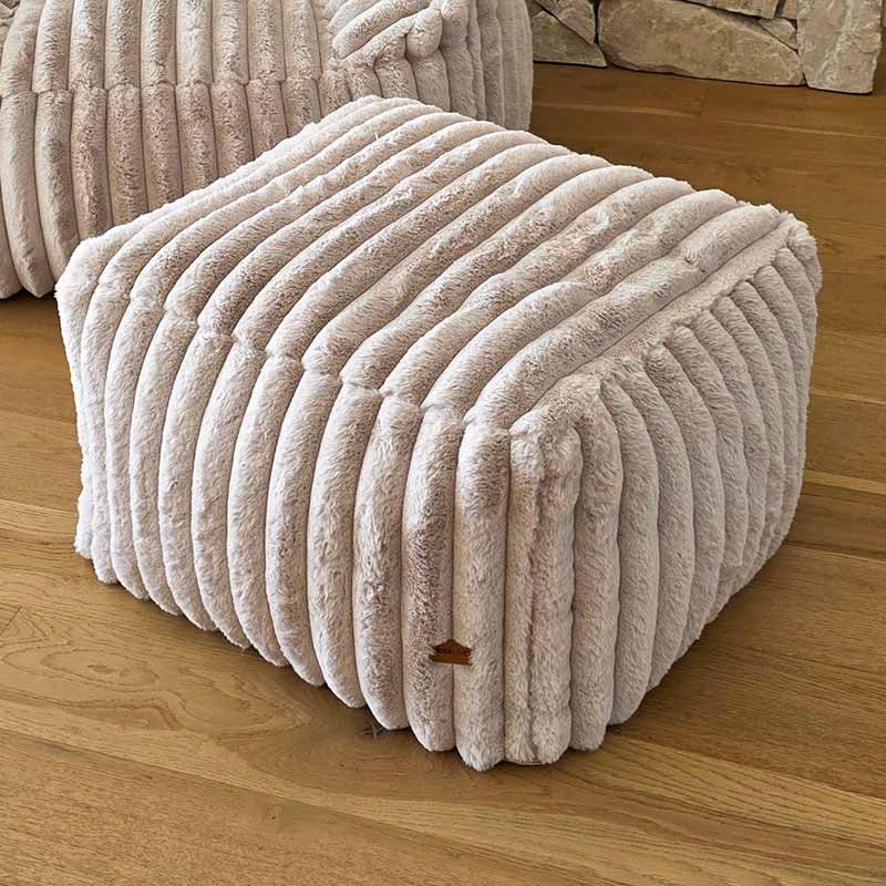 Callie indoor corduroy ottoman by Mooi Living with structured design, suitable as a footrest or side table.