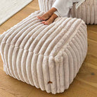 Top view of the textured corduroy Callie ottoman indoor bean bag by Mooi Living placed in a contemporary living space.
