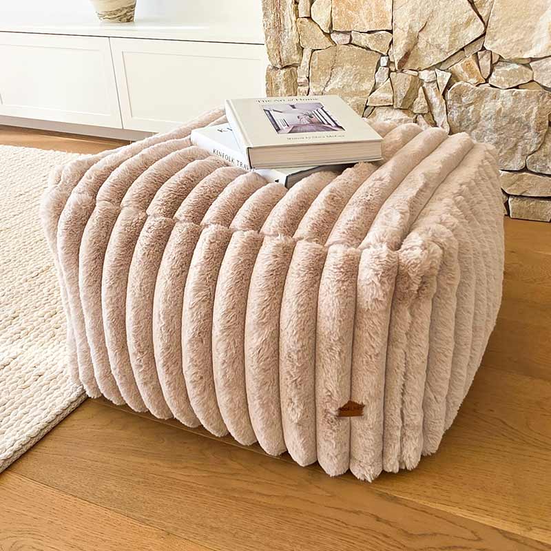 Mooi Living Callie corduroy ottoman positioned indoors as a low side table or footrest.
