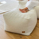 Serena Ottoman in Cream bouclé indoor bean bag by Mooi Living.