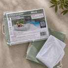 Folded Talia Pool Float bean bag cover in Sage green and inner bag in a Mooi Living packaging.