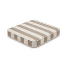 A square outdoor chair pad cushion with taupe and owhite horizontal stripes, shown at an angle on a white background by Mooi Living, MOO-STR-TAU-CHPAD