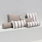 Taupe-cushion-set-on-white-bench