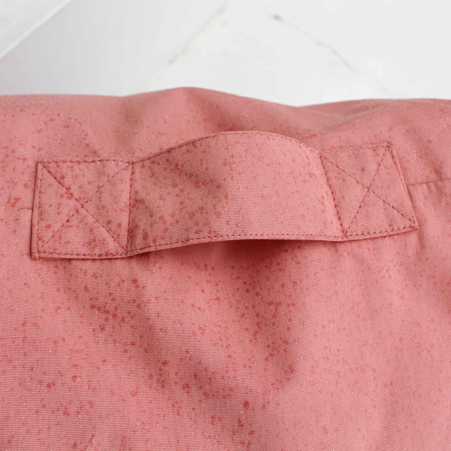Close-up of a blush olefin fabric - Bora Bora Chair with a matching stitched strap detail,MOBORABB-BLUSH