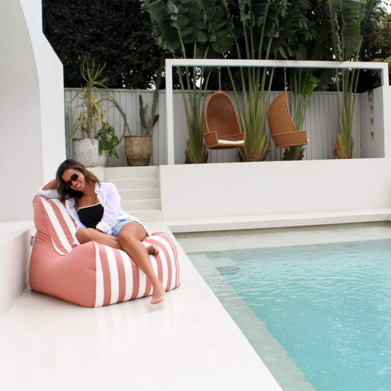 outdoor blush bora bora bean bag chair in blush and white stripe, poolside, MOBORABB-STRI-BLU