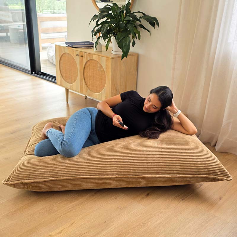 Corduroy Cloud in Caramel. A versatile corduroy bean bag designed for modern living - use it flat, upright, or hammock-style for effortless comfort in every corner of your home.