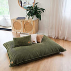 Corduroy Cloud in Olive Green  indoor bean bag by Mooi Living. A versatile corduroy bean bag designed for modern living - use it flat, upright, or hammock-style for effortless comfort in every corner of your home.