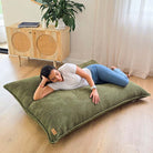Corduroy Cloud in Olive Green indoor bean bag by Mooi Living. A versatile corduroy bean bag designed for modern living - use it flat, upright, or hammock-style for effortless comfort in every corner of your home.