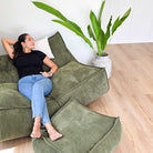 Mooi Double Cord Bean Bag  indoor bean bag by Mooi Living and Cord Ottoman in Olive Green. Dual seating in luxe cord fabric featuring three inner bags for structured support and effortless setup.