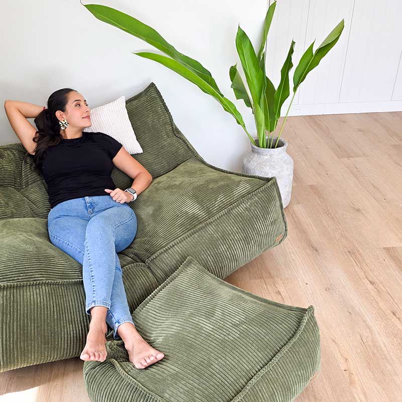 Mooi Double Cord Bean Bag  indoor bean bag by Mooi Living and Cord Ottoman in Olive Green. Dual seating in luxe cord fabric featuring three inner bags for structured support and effortless setup.