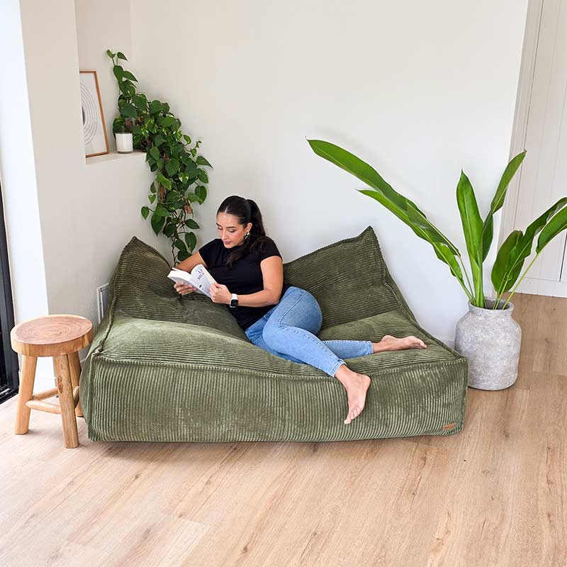 Mooi Double Cord Bean Bag indoor bean bag by Mooi Living in Olive Green. Dual seating in luxe cord fabric featuring three inner bags for structured support and effortless setup.
