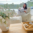 Mooi Living Cream Serena bouclé indoor bean bag chair paired with matching ottoman.